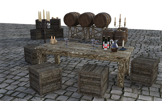 A Table With Wine Glasses And Barrels