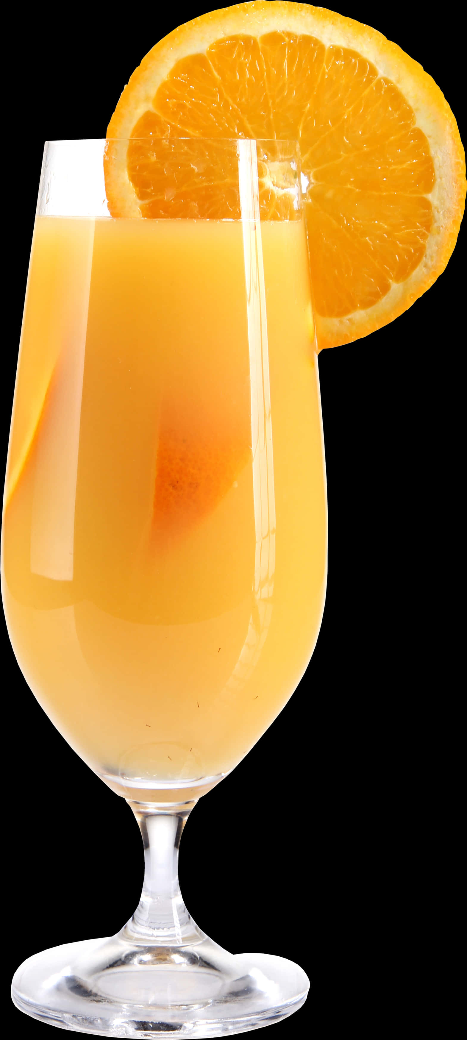 A Glass With Orange Juice And A Slice Of Orange