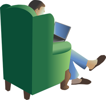 A Man Sitting In A Green Chair With A Laptop