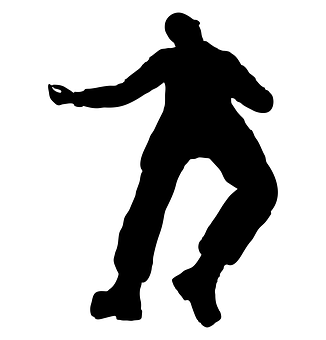 A Silhouette Of A Man Dancing