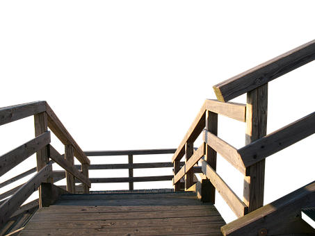 A Wooden Stairs Leading Up To A Black Background