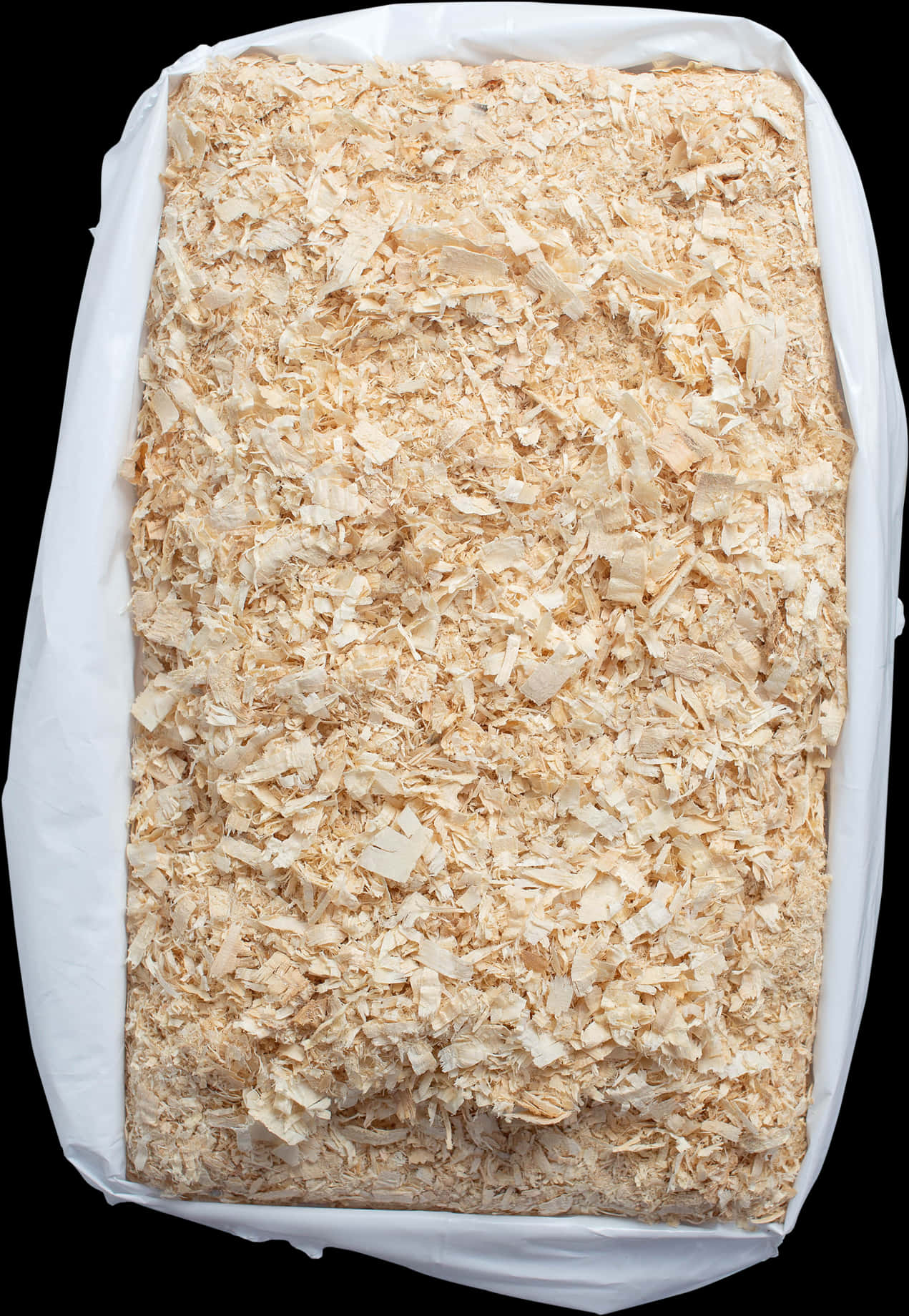 A Bag Of Sawdust On A Black Background