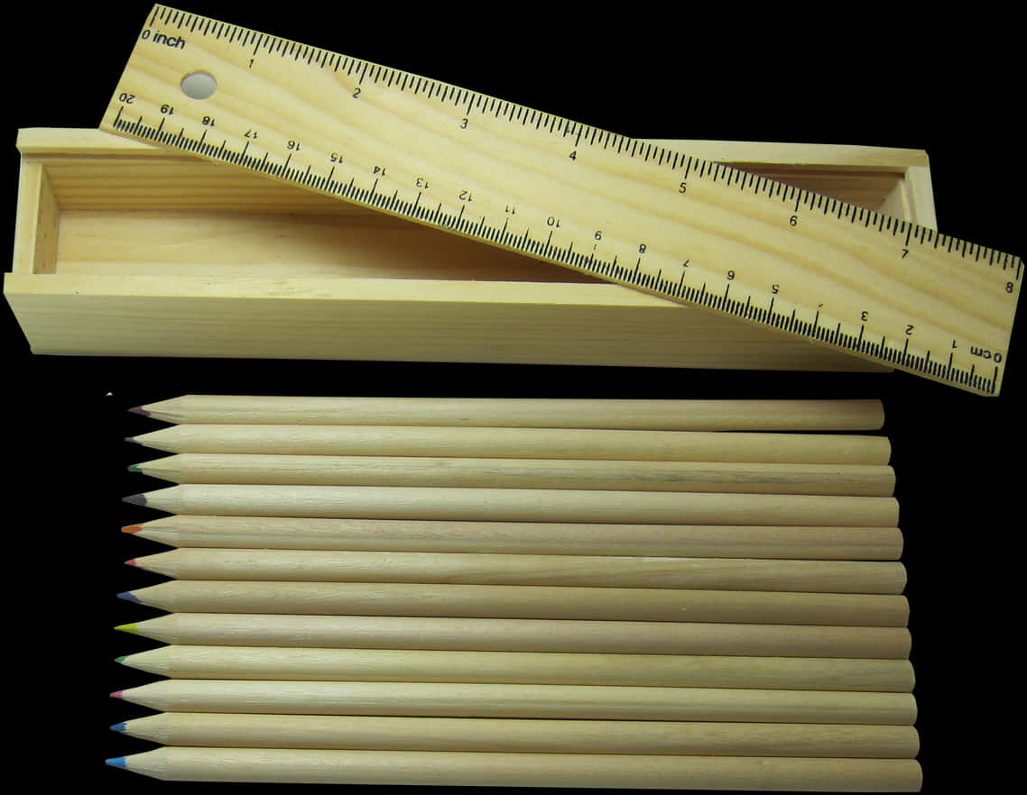 A Wooden Box With Colored Pencils And A Ruler