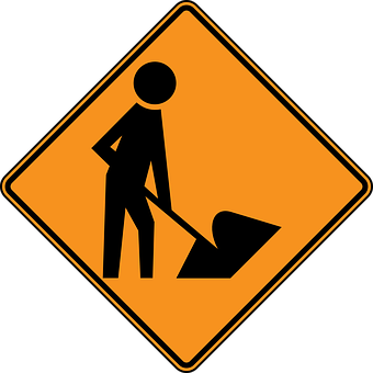 A Yellow Sign With A Person Digging A Hole