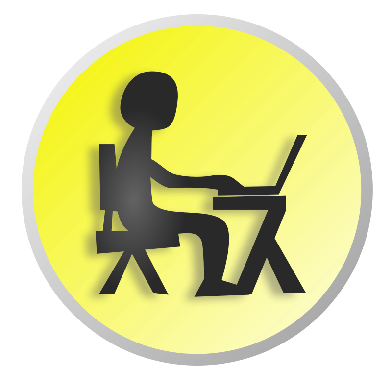 A Person Sitting At A Desk