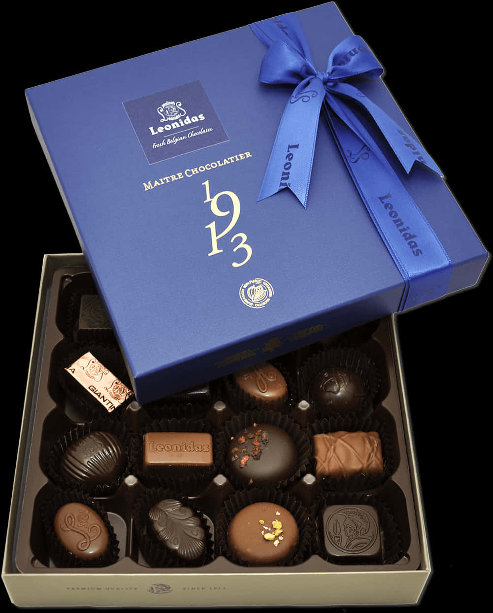 A Box Of Chocolates With A Blue Bow